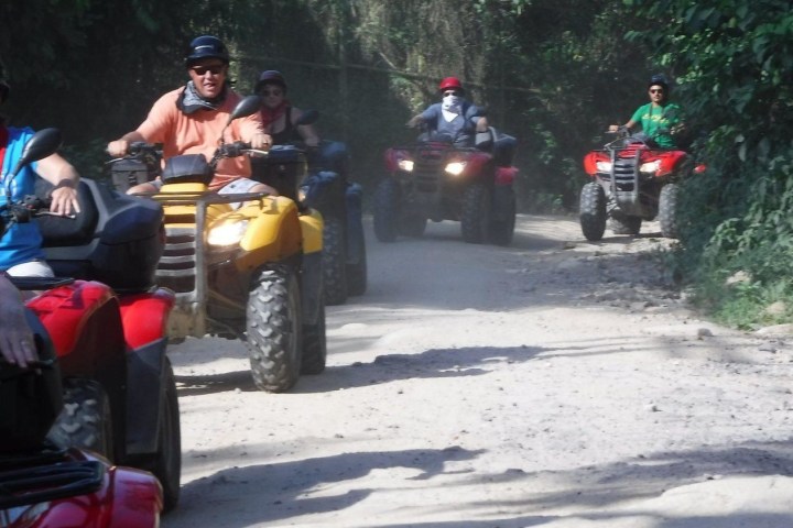 ATV's on dirt road